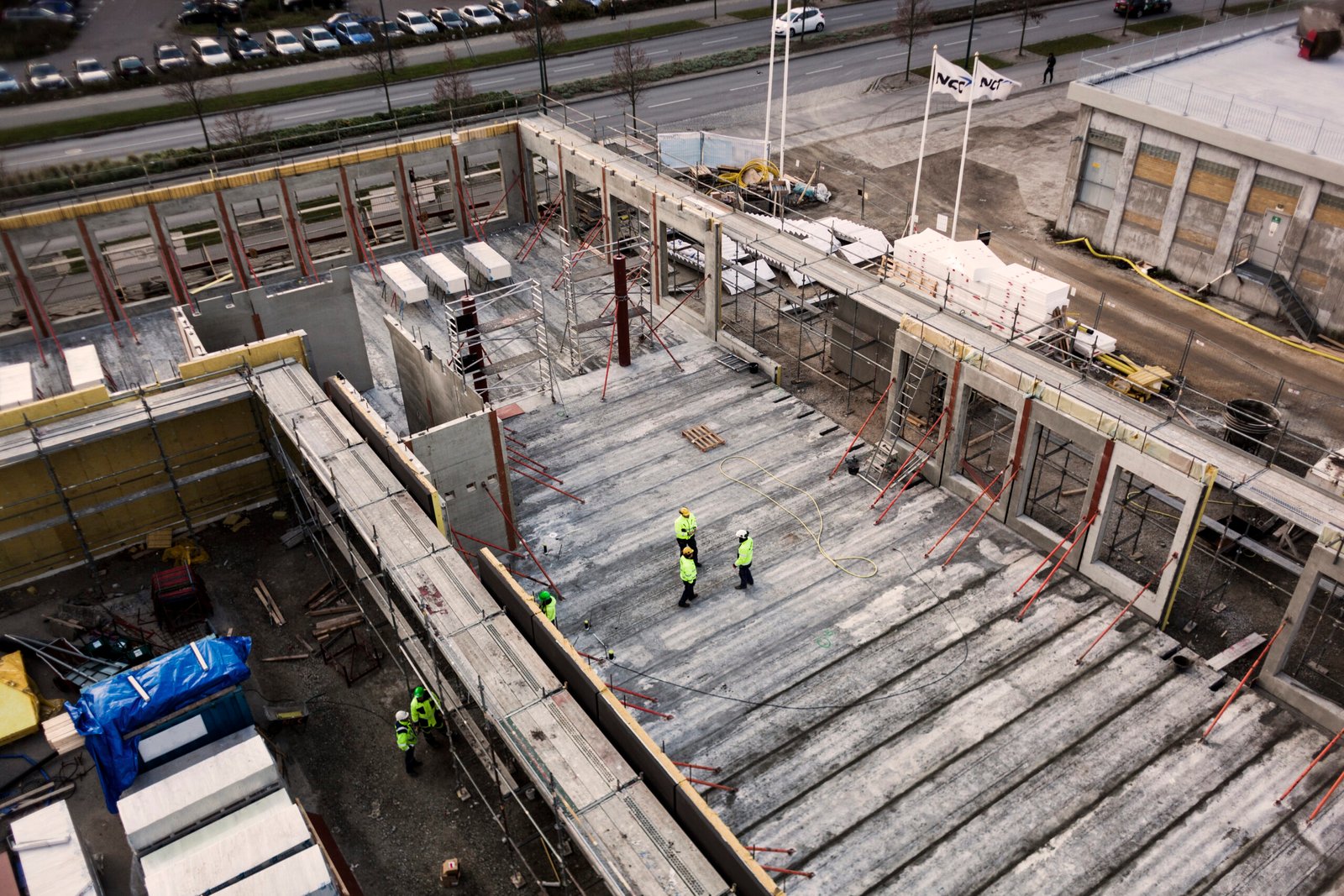 Workers oversee progress at construction site